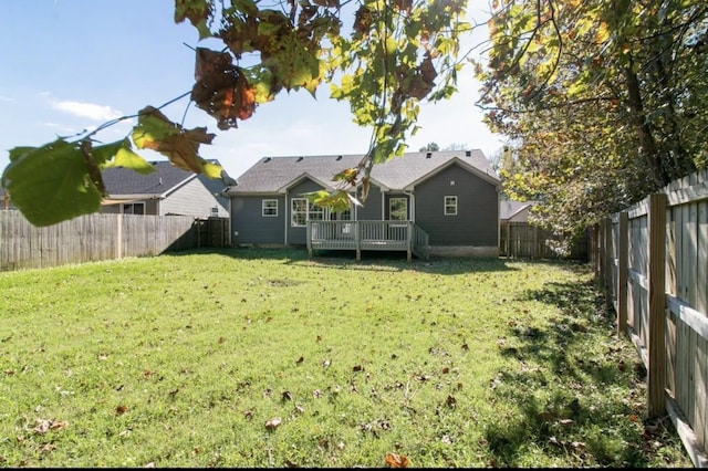 view of yard featuring a wooden deck