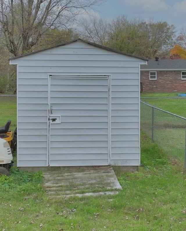 view of outdoor structure featuring a yard