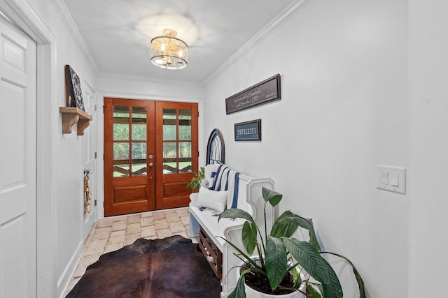 doorway to outside with ornamental molding, french doors, and a notable chandelier