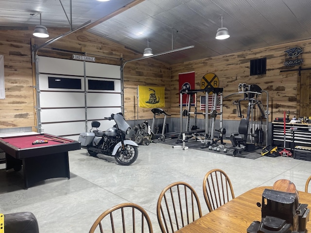 garage featuring wooden walls