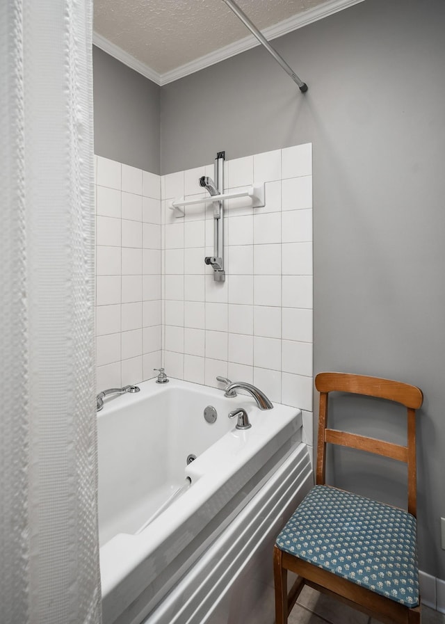 bathroom featuring a textured ceiling and crown molding