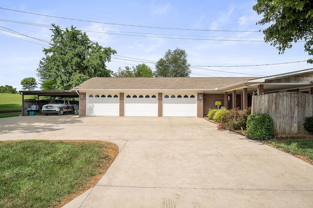 garage featuring a lawn