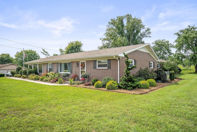 ranch-style home featuring a front yard