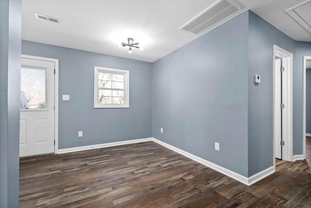 interior space with dark hardwood / wood-style flooring