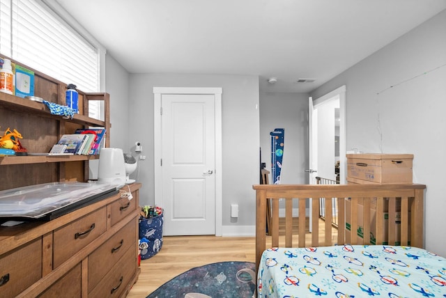 bedroom featuring light hardwood / wood-style flooring