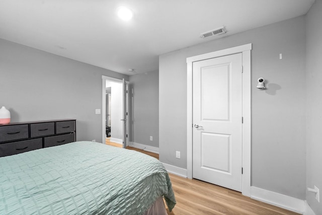 bedroom featuring light wood-type flooring