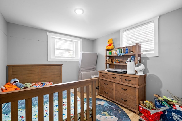 bedroom with light hardwood / wood-style flooring