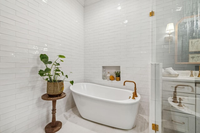 bathroom with tile walls and a washtub