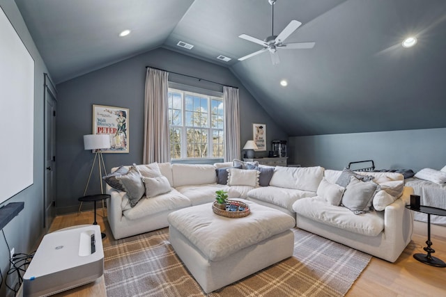 living room featuring lofted ceiling, ceiling fan, and hardwood / wood-style floors