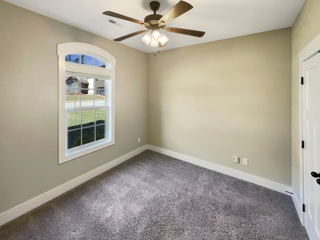 carpeted empty room with ceiling fan