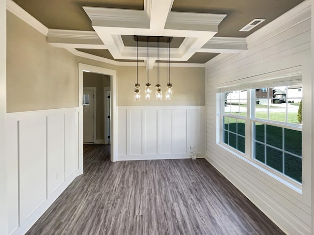 unfurnished dining area featuring dark wood-type flooring, ornamental molding, beamed ceiling, and coffered ceiling