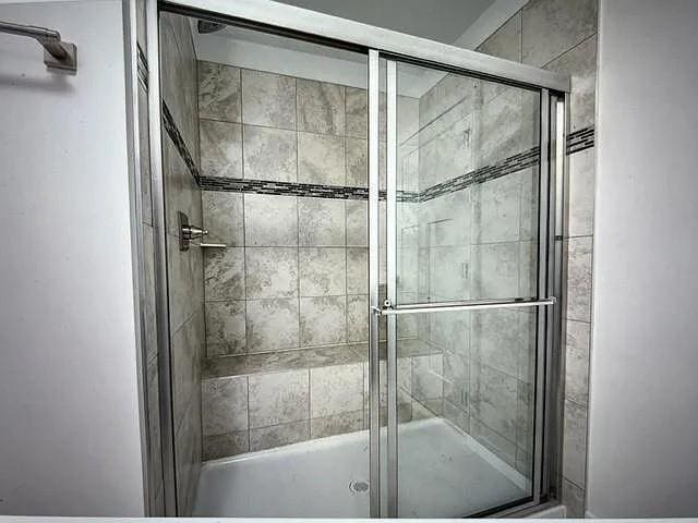 bathroom with walk in shower