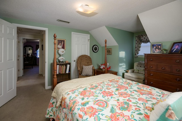 carpeted bedroom with a textured ceiling