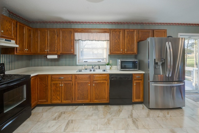 kitchen with black appliances and sink