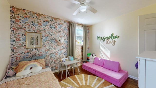 bedroom featuring dark wood-type flooring and ceiling fan