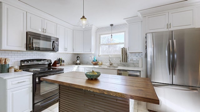 kitchen with white cabinets, black appliances, wooden counters, sink, and light tile patterned floors