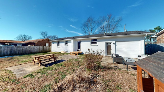 back of property featuring a patio area