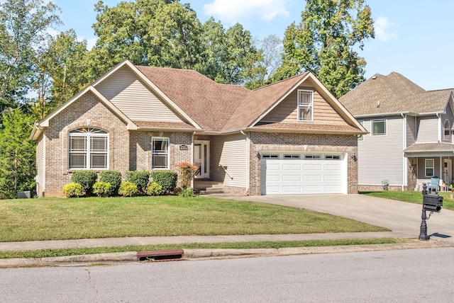 view of front of property featuring a garage and a front lawn