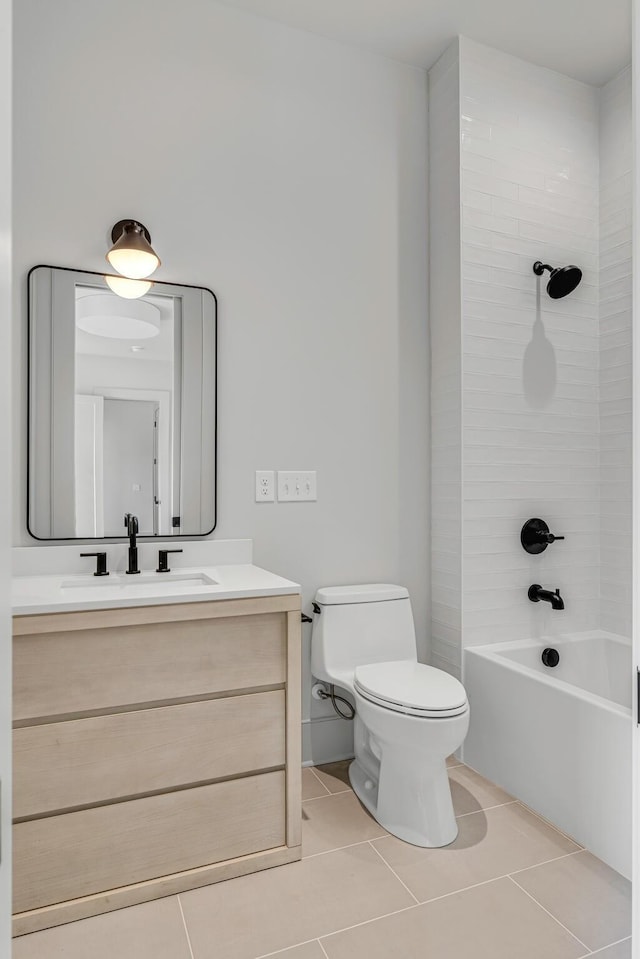 full bathroom featuring toilet, tile patterned floors, tub / shower combination, and vanity