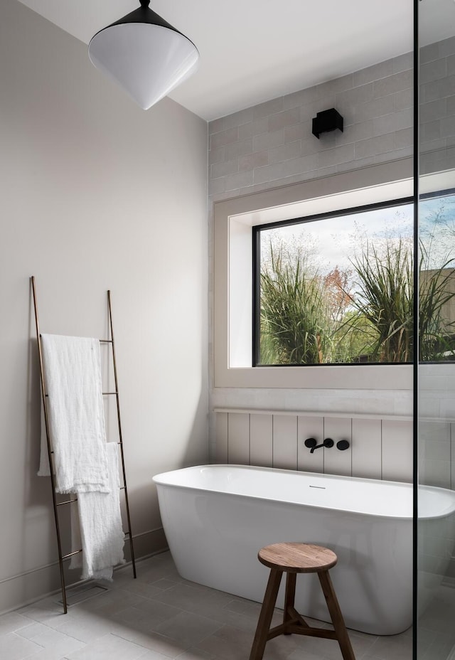 bathroom with a washtub