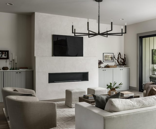 living room with an inviting chandelier