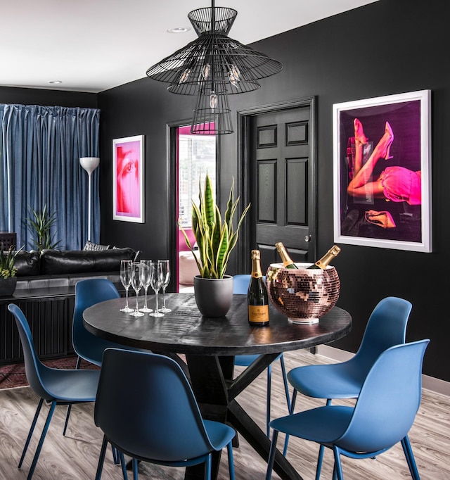 dining room with hardwood / wood-style floors