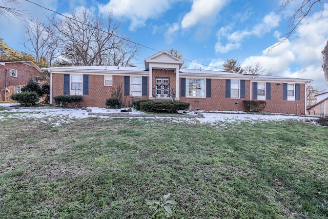 ranch-style home with a front yard