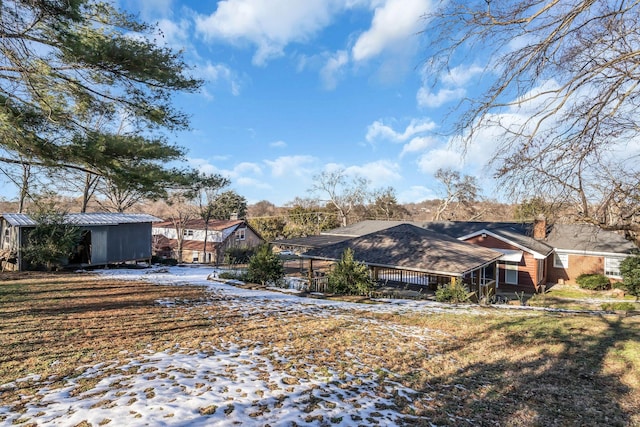 view of snow covered house