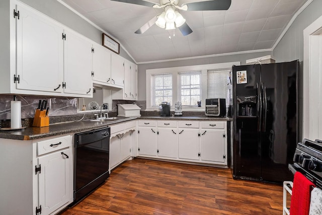 kitchen featuring dark wood-type flooring, white cabinets, black appliances, and sink