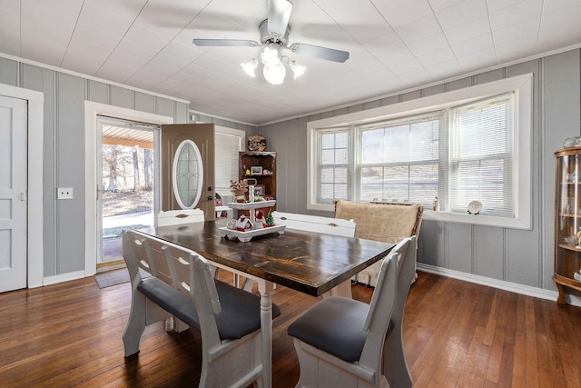 dining room featuring dark wood-type flooring and ceiling fan