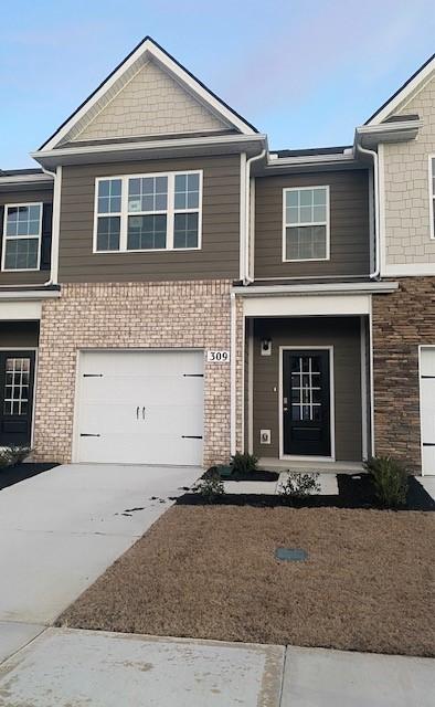 view of front of home featuring a garage