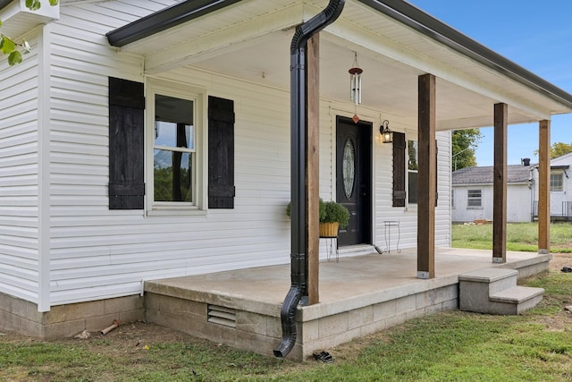 entrance to property with a porch