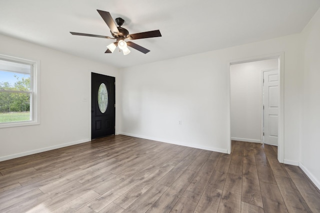 entryway with light wood-type flooring and ceiling fan