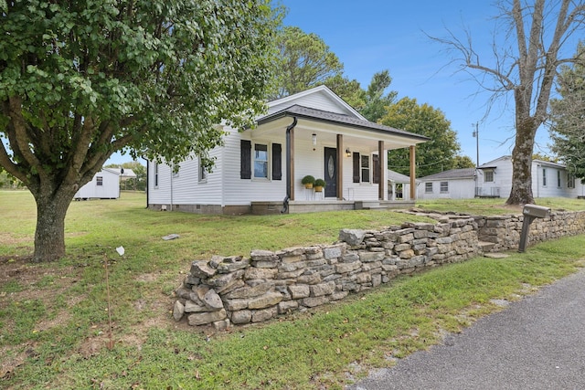 view of front of property with a front lawn and a porch