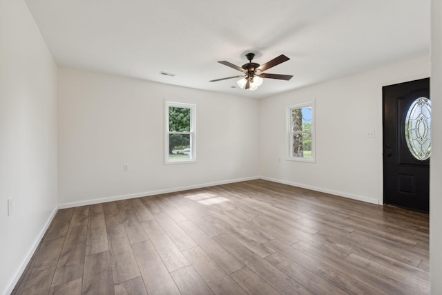 entrance foyer featuring hardwood / wood-style flooring and ceiling fan