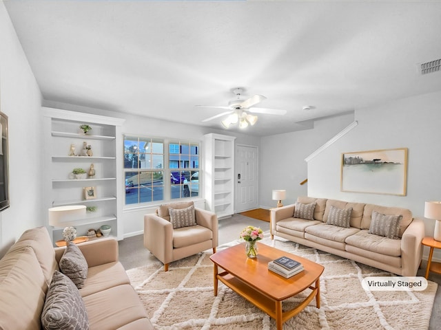 living room with ceiling fan