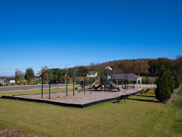 view of playground featuring a yard