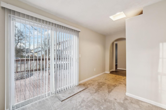 empty room featuring carpet flooring