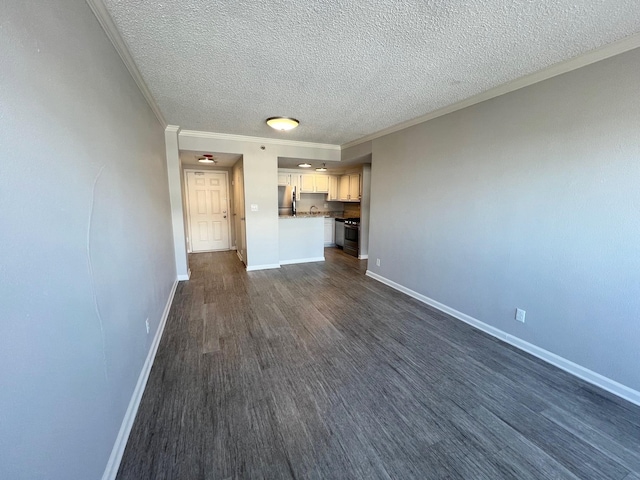 unfurnished living room with a textured ceiling, dark wood-type flooring, and ornamental molding