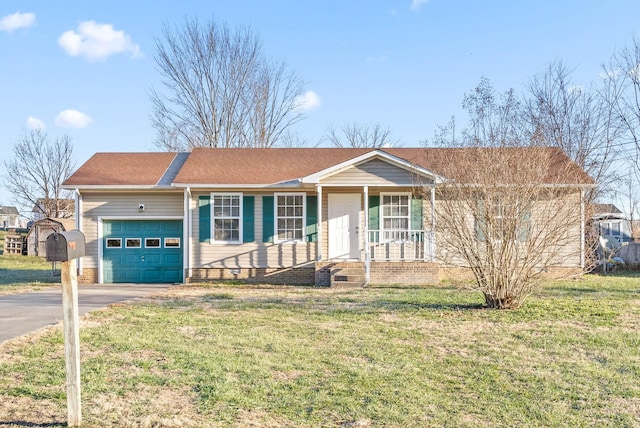 single story home featuring a front lawn and a garage