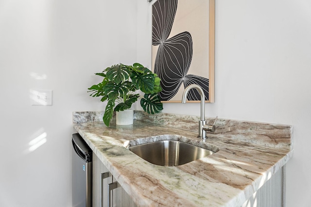 kitchen featuring dishwasher and sink