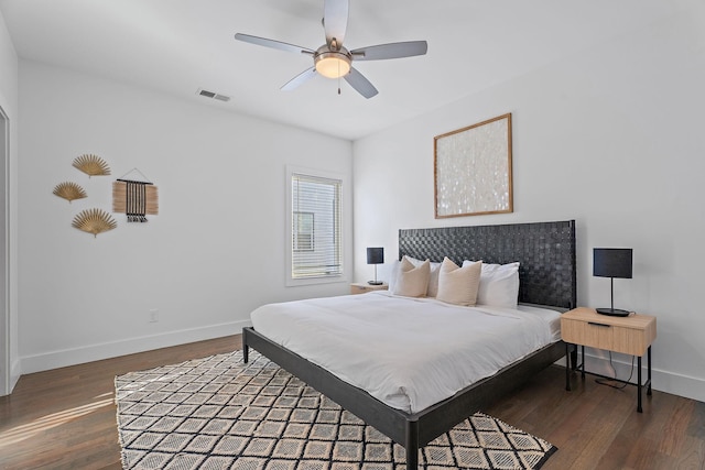 bedroom with ceiling fan and hardwood / wood-style floors