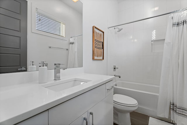 full bathroom with toilet, vanity, shower / bath combination with curtain, and hardwood / wood-style flooring