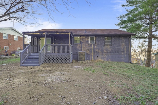 exterior space featuring cooling unit and a porch