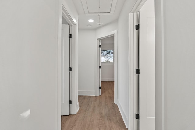 corridor featuring light wood-type flooring