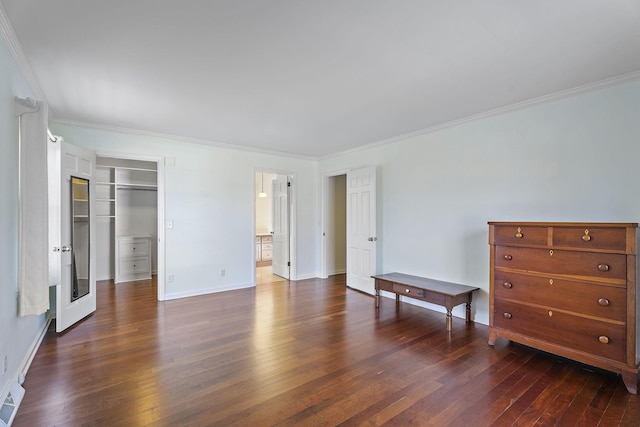 bedroom featuring dark hardwood / wood-style flooring, a closet, and ornamental molding