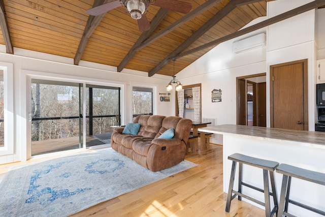 living room featuring ceiling fan with notable chandelier, wood ceiling, beamed ceiling, light hardwood / wood-style flooring, and a wall mounted air conditioner