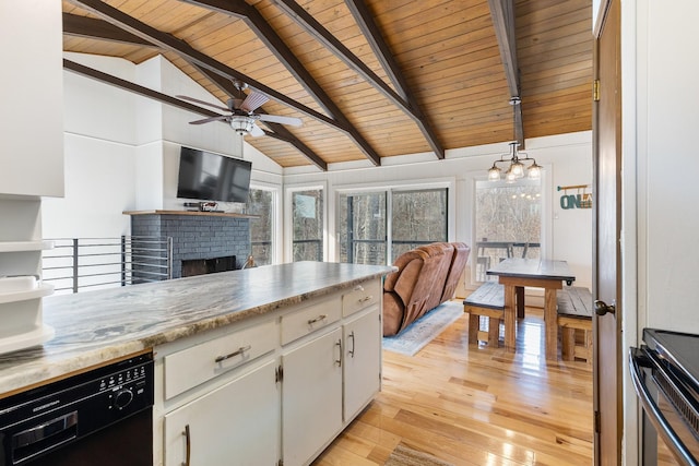 kitchen with white cabinets, dishwasher, vaulted ceiling with beams, hanging light fixtures, and wooden ceiling