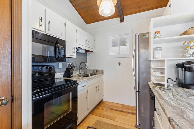 kitchen with black appliances, vaulted ceiling with beams, sink, wood ceiling, and white cabinets