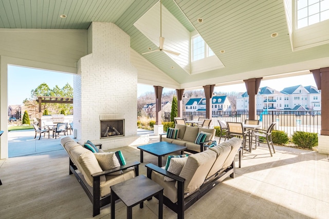 view of patio / terrace featuring an outdoor living space with a fireplace